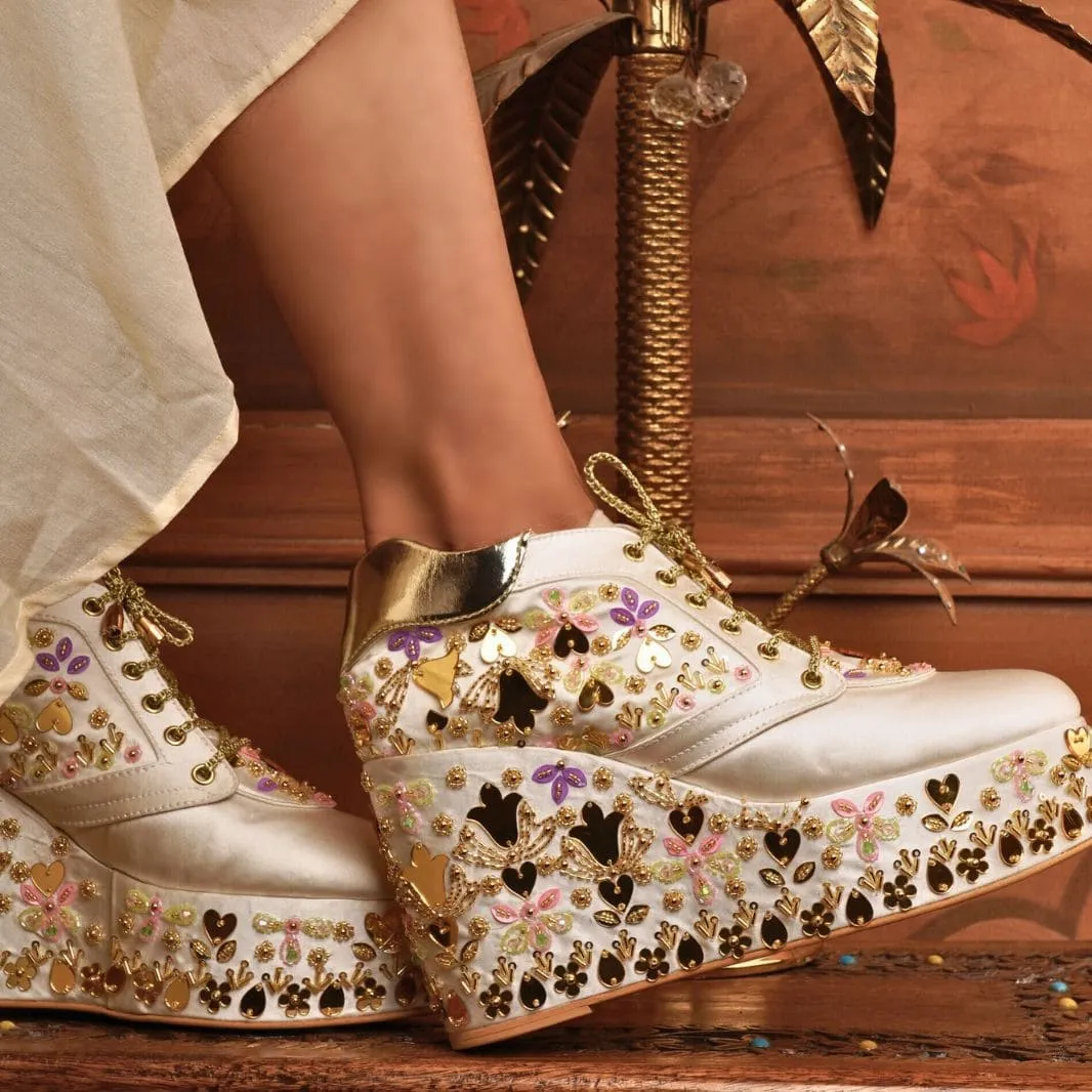 Custom white multi color embroidery bridal sneaker wedges. High Heeled Mary Janes