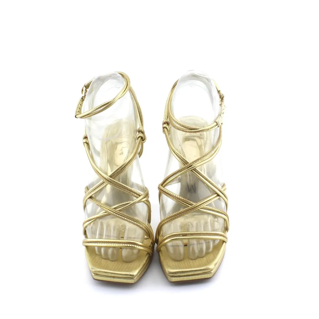 JLO . High Heels To Go With Dress