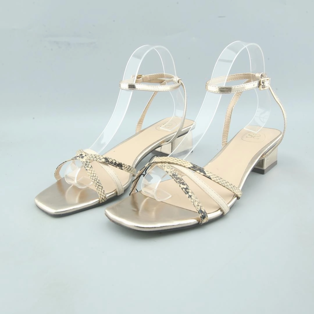 SFERA . High Heels And Mini Skirt