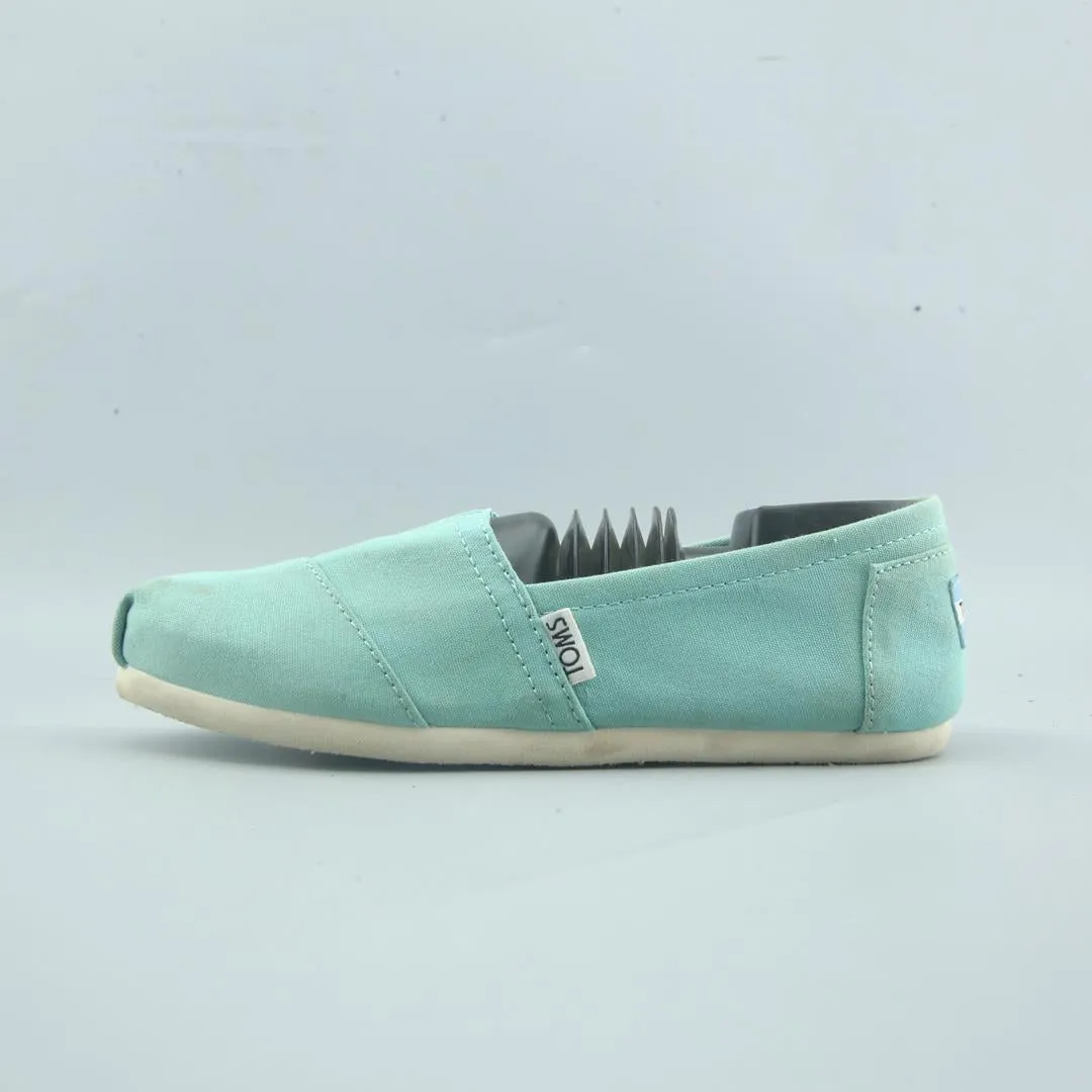 TOMS . Tennis Shoes Slip On